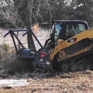 Image of equipment shredding trees